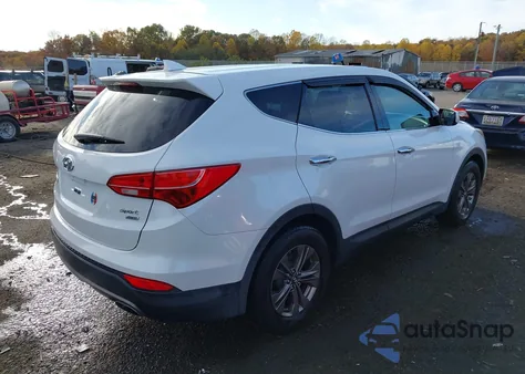 2014 Hyundai Santa Fe Sport 2.4L z USA, uszkodzony, nr VIN 5XYZTDLB3EG193894